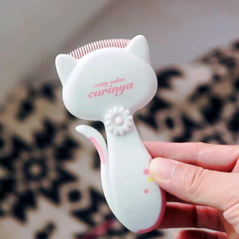 The elbow is designed without flying hair Dog - a - cat comb corner comb and cat hair for cat hair removal