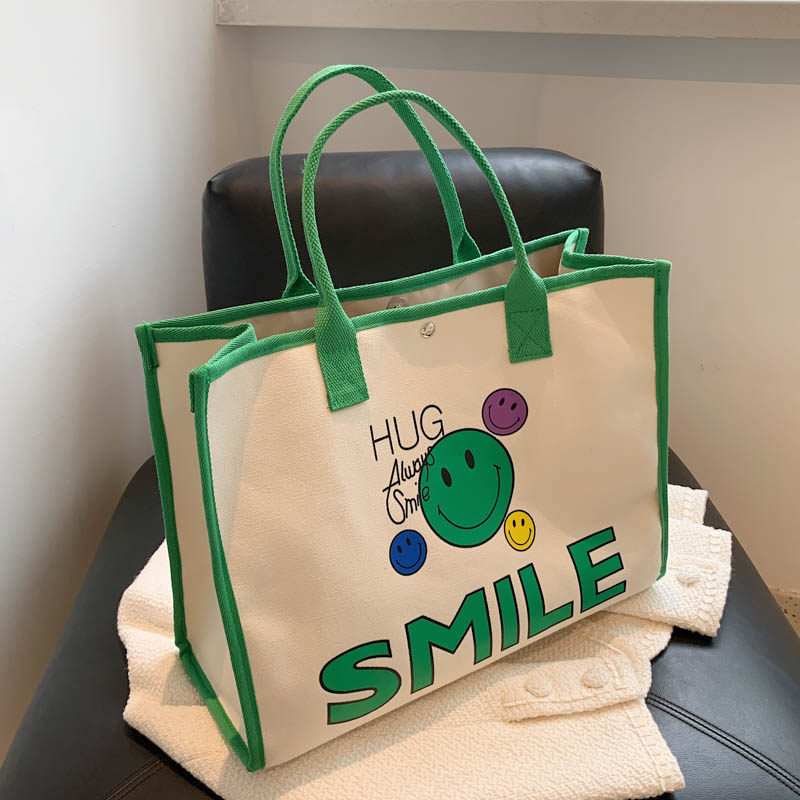 Hand Canvas Mother-baby Bag 2021 New Korean Version Stylish Smiley Face Mommy Bag Large Capacity Shopping Bag special bag