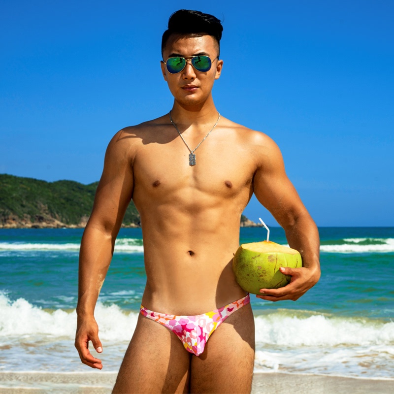 Spicy Pink Ultra-Low-Waist Bulge-Enhancing Bikini Men's Swim Trunks, Revealing Large Size, Thong-Style, Half-Covering the Buttocks, Triangle Shape, Masculine, Tight-Fitting
