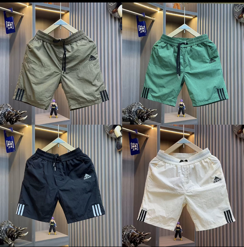 2026 Summer New Casual Shorts Men's Five-Point Shorts Loose Quick-Drying Trendy Brand Versatile Beach Shorts 9813 2026 Summer New Casual Shorts Men's Five-Point Shorts Loose Quick-Drying Trendy Brand Versatile Beach Shorts 9813