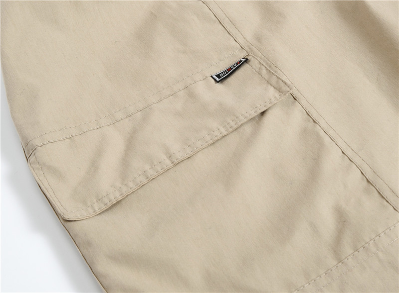 Quần trung niên nam đi biển quần rộng giản dị quần nam quần lớn ở eo quần short cotton năm quần nam quần thể thao