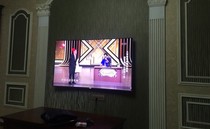 Shanghai TV hanging wall TV installation Hangpu Mingan District Jingan District Putuo TV installation rack installation