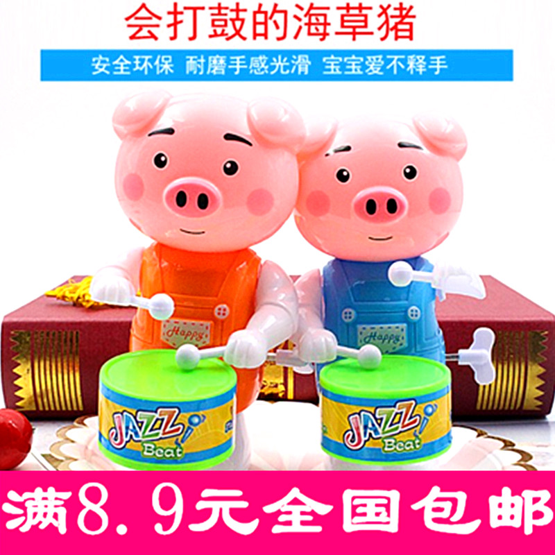 On the chain drumming pig drumming toy clockwork small toys children's puzzle stall supply piggy pig