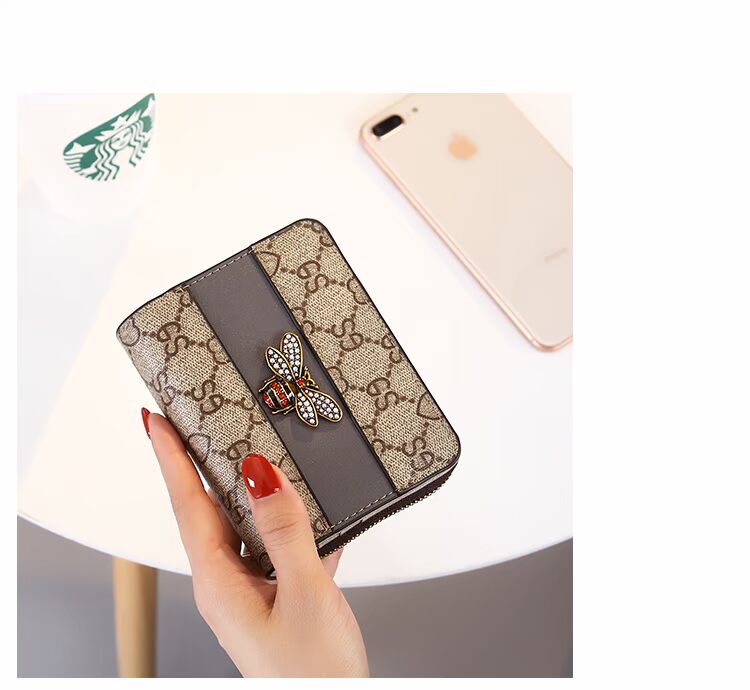 2019 Châu Âu và Hoa Kỳ gói thẻ mới ví một gói phụ nữ in ngắn đa chức năng vị trí thẻ ong gấp hai lần ví - Ví tiền ví vans
