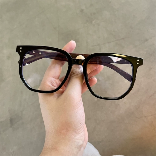 Черная рама вегетарианский артефакт против легкого легкого высокого уровня сенсорные очки для лица на лицевая лицо стойка.