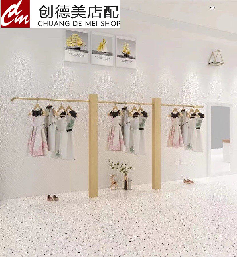 Creative stainless steel wire drawing titanium alloy upper wall floor-type single-lever rack clothes-clothes shop for women with wooden posts