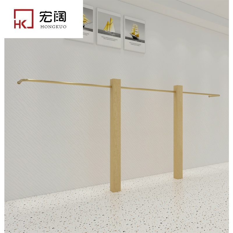 Macro Width Custom Clothing Store Show Rack Upper Wall Positive Side Hanging Stainless Steel Wire Drawing Yellow Titanium Alloy Clothing Store Hanging Hanger