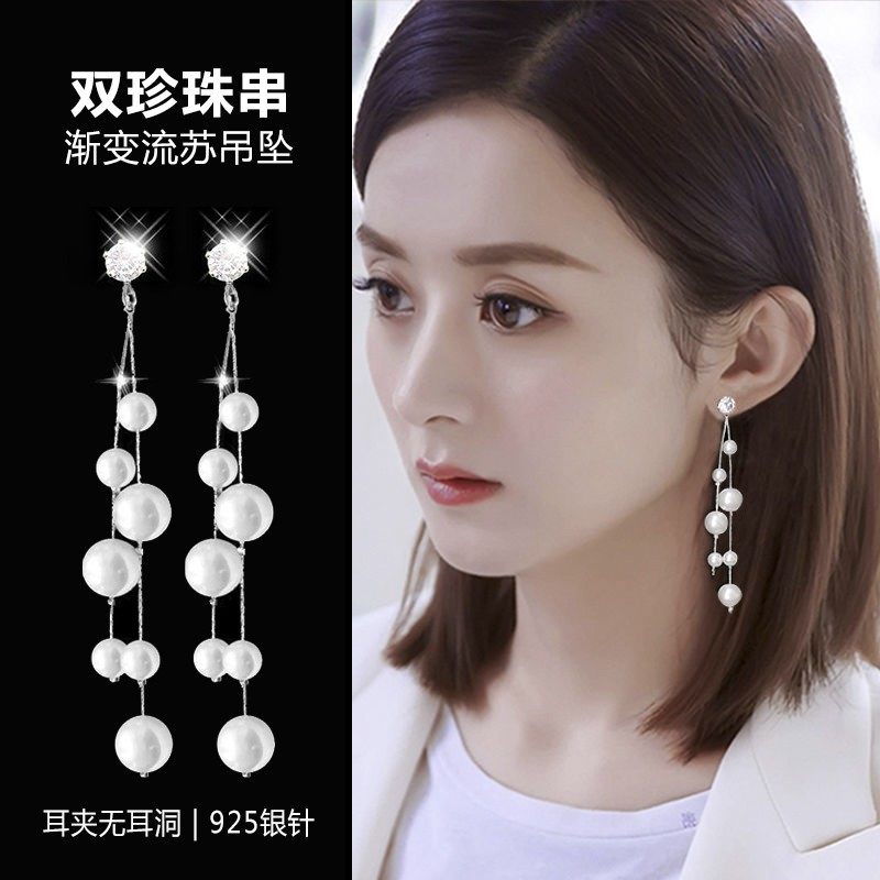 Pearl Streaming Suear Clip Woman Without Earrings Earrings 2021 New Tide round face pendant lukewarm with a little high level of senior