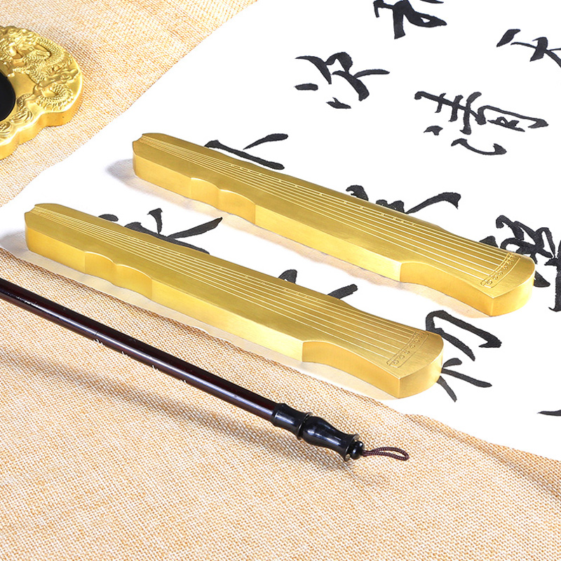 Solid brass paper fuxi guqin room four baby calligraphy town ruler pen paper paperwork town rubber paper town rubber