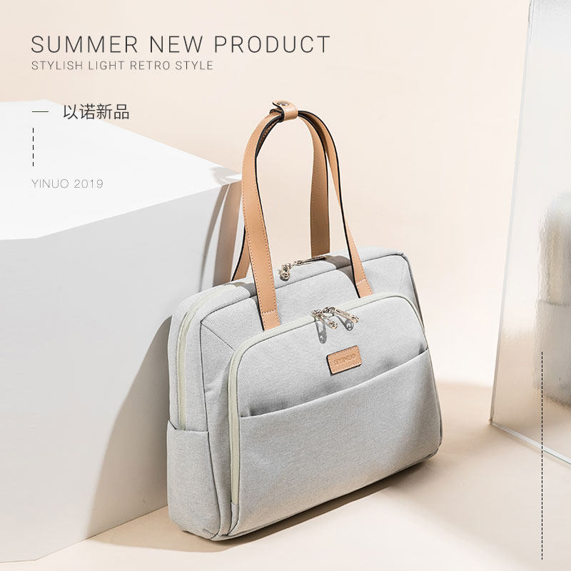 Nino applies to the Apple Computer Package Female Hand Pen Electric Package 13314 15 6 16 inch Single shoulder handbag