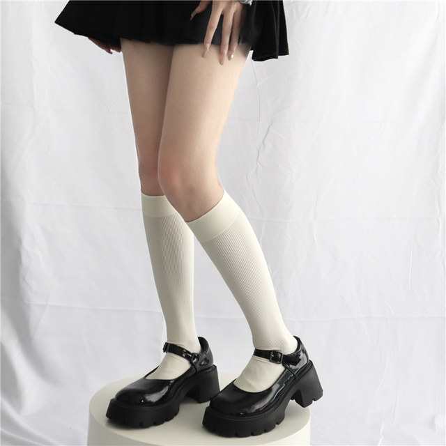 ຄວາມດັນ calf socks stovepipe mid-tube warm jk college style spring and autumn goose down knee socks basic socks uniform black