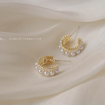 Korean temperament earrings High sense earrings niche Pearl c-shaped earrings Net Red simple cold wind ear jewelry women