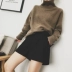 Quần short len ​​nữ mùa thu đông 2018 mới eo cao một chữ rộng chân rộng Hàn Quốc giản dị quần boot đáy mặc quần ngắn ống rộng Quần short