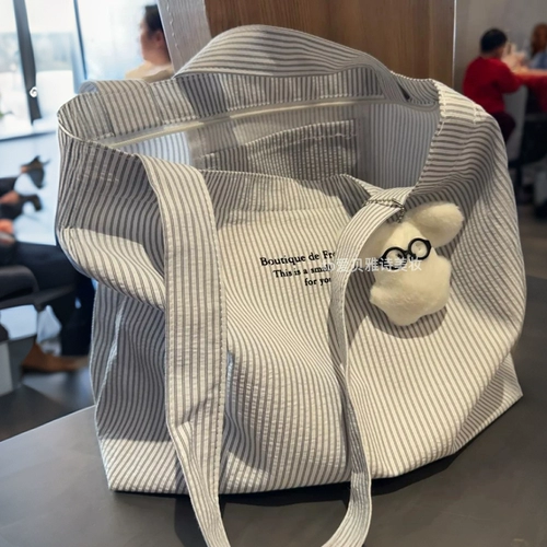 Кто это знает? Способность очень удовлетворяет ~ Корейская ленивая холстальная сумка для женщин 2025 Новая модель Портативная большая пропускная способность релаксация