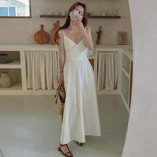 ລະດູຮ້ອນເກົາຫຼີ chic French temperament cross V-neck strap high waist slim solid color suspender dress long skirt for women