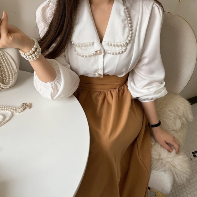 Korean chic French age-reducing doll collar pearl embellished long-sleeved shirt + high waist slimming skirt