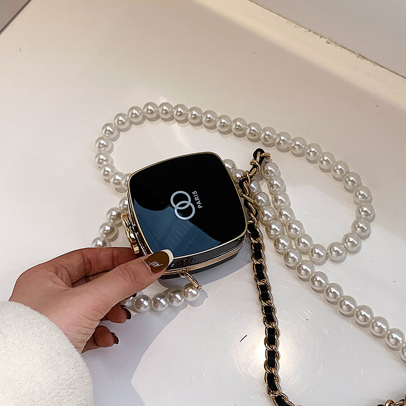 French small crowd textured bag Girl 2022 new exploits mini skew satchel red bag 100 hitch pearl chain bag