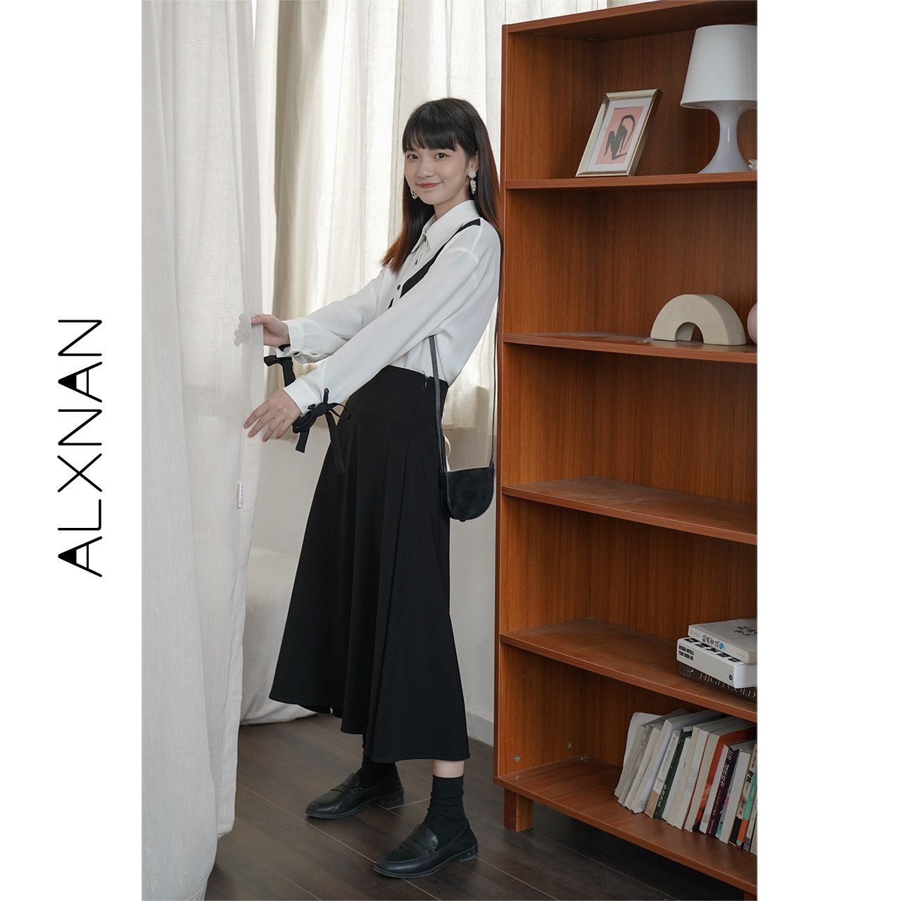 Lu Xiangnan A-line skirt spring women's mid-length skirt covering the crotch is thin and Western style 2022 new little black dress