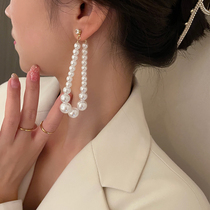 Personality exaggerated long big pearl earrings Korean 925 silver needle suitable for round face light luxury Net red earrings nail earrings female