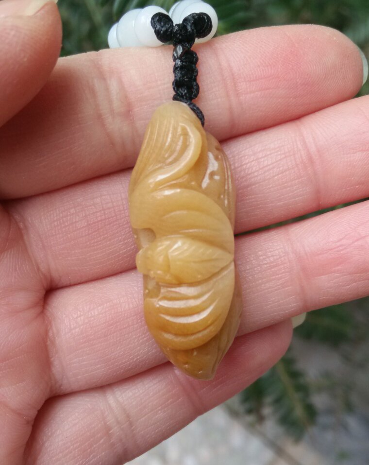 Ning Qiang Coral Jade Yellow Longevity Fruits Happiness Lifetime Happiness Raw Peanuts Hand-carved Pendant Necklace Fossil Pendant