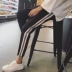 Mùa xuân và mùa thu mới quần nam chân quần harem quần thể thao quần nam quần dài phiên bản Hàn Quốc của xu hướng quần miệng