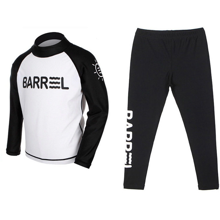 The new boys' and girls' split diving suits long-sleeved sunscreen snorkeling and surfing suits are quick-drying swimsuits for upper-school students