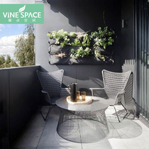 Nordic balcony combination rattan table and chair Creative outdoor leisure rattan chair webbing braided rope sofa Designer model room