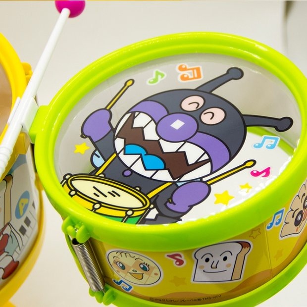 Nhật Bản ban đầu Pinocchio bánh mì siêu nhân trống trẻ em trống nhạc cụ trống nhỏ đồ chơi đàn đồ chơi
