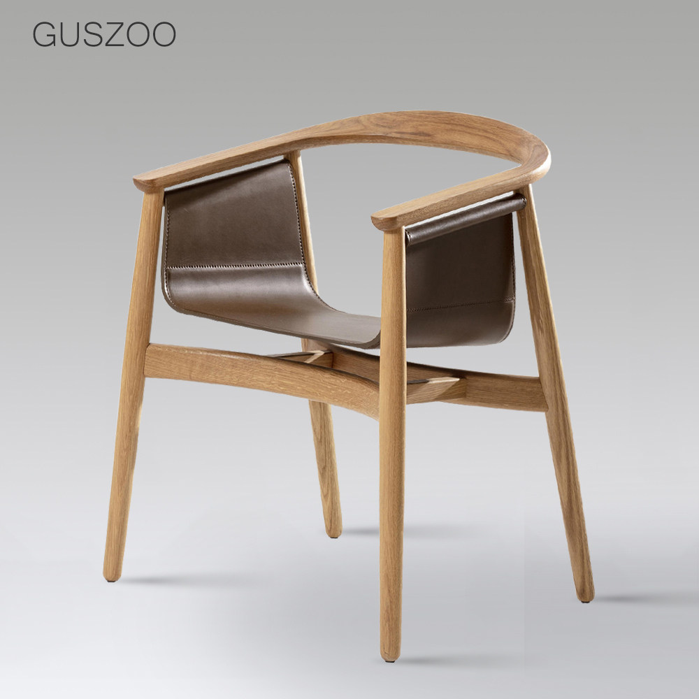 Nordic saddle leather leather dining chair high-end first layer cowhide armchair light luxury solid wood chair Italian designer chair