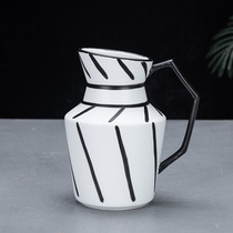 Nordic handheld black and white striped ceramic vase creative dry flower flower flower arranger living room adornment minimalist floral ornament