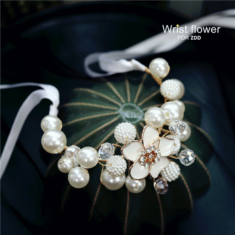 Handmade exquisite luxury imitation pearl bridal hand flower golden bridesmaid wrist flower knot wedding hand tied flower children's show