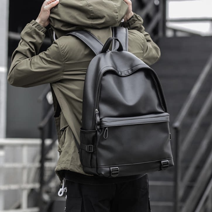 Hong Kong I Tgreg cortice student bag Han edition of shoulder bag male business trend simple travel backpack male bag