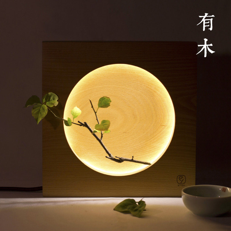 There are wooden full moon lamp Japanese decorative table lamp small night lamp bedhead solid wood new Chinese wood Zen wood