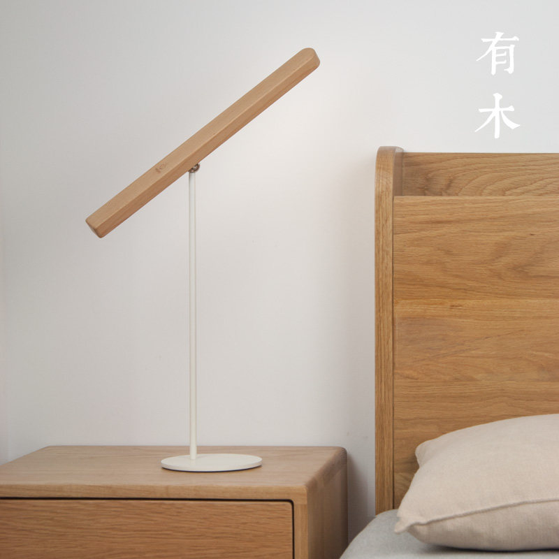 There are wooden table lamp Nordic Japanese simple bedside lamp rechargeable desk adjustable light eye protection bedroom solid wood students