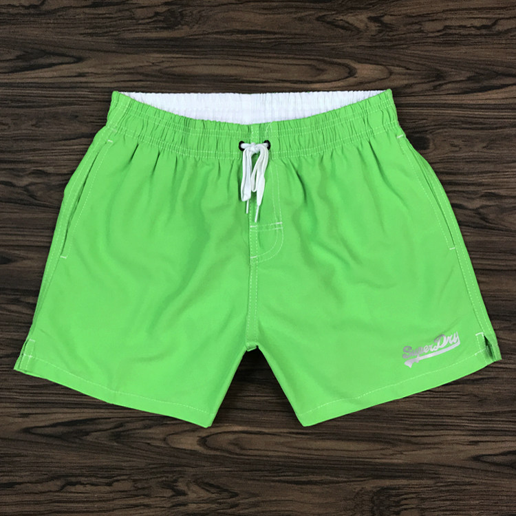 Men's quick-drying beach pants surfing swimming trunks summer large size sports and leisure fitness shorts loose inner mesh three-point pants