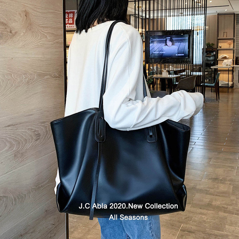 Tide brand leather one-shoulder extra bag bag women's texture large capacity handheld popular 2022 new wild commuter Korean version