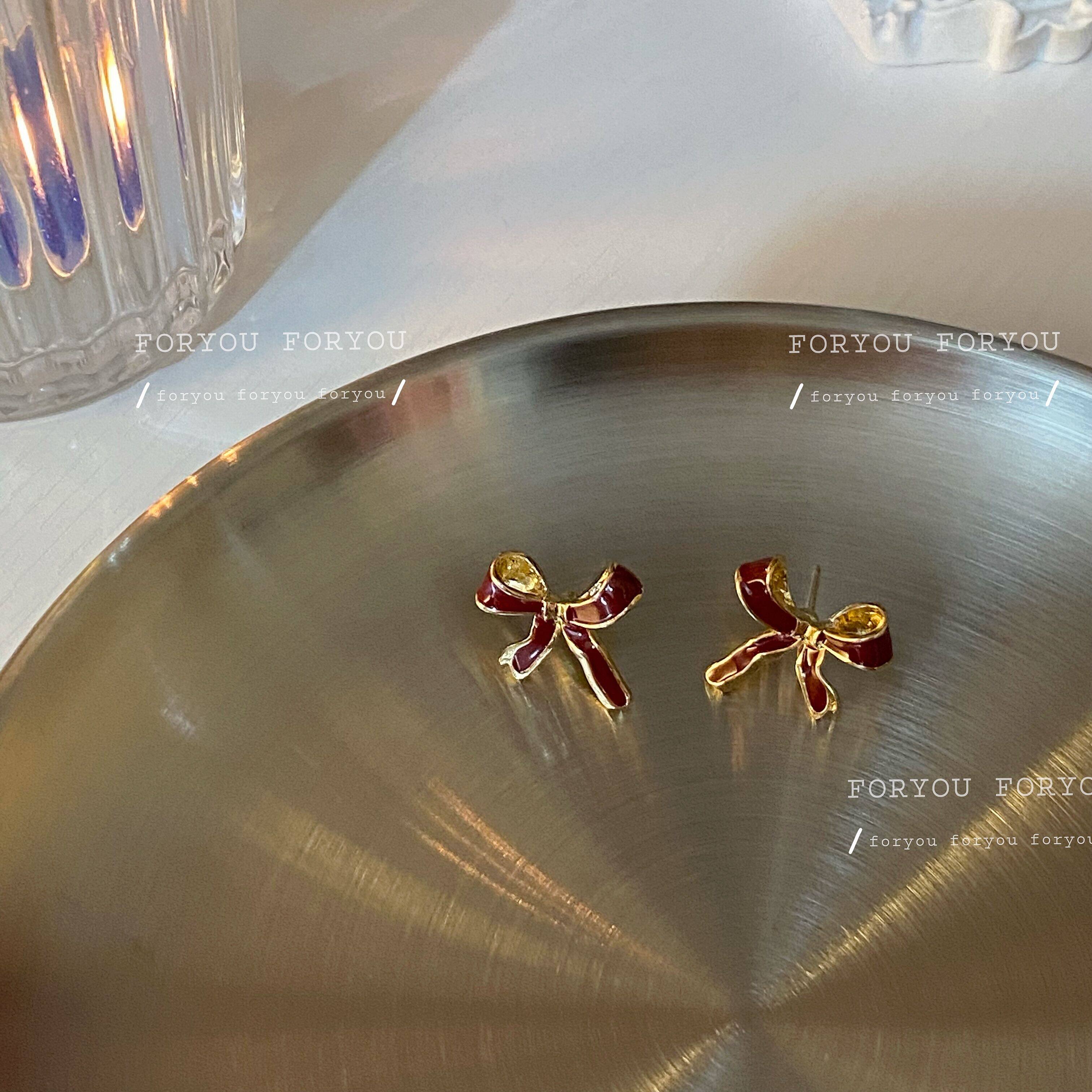 Red bow showing white girl's heart personality Christmas earrings fashion high-end earrings New Year's earrings ear clip women - Taobao