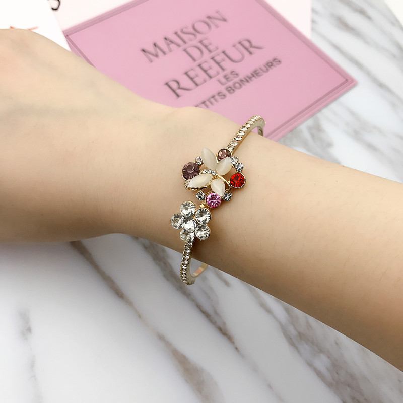 Nhà máy trực tiếp phiên bản Hàn Quốc của mùa hè mới hợp kim rhinestone mèo mắt tốt vòng đeo tay nữ vòng tay nữ trang sức vòng tay vàng