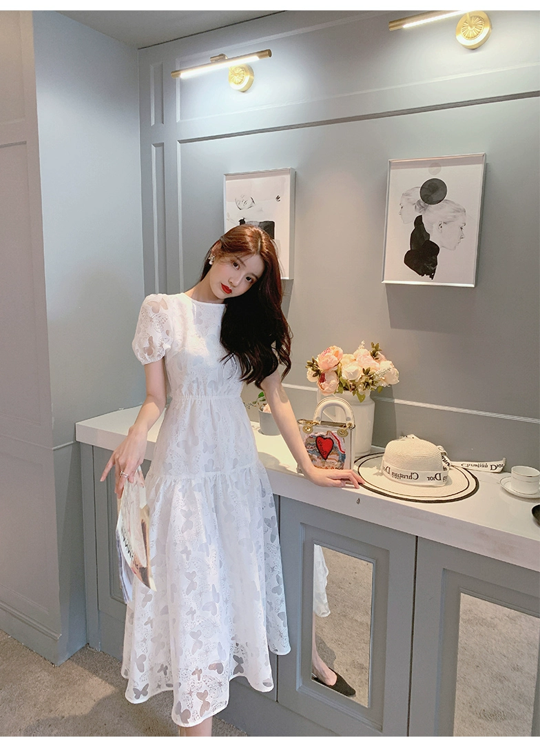 Váy ngắn tay xuân hè 2020 mới của phụ nữ gợi cảm backless mid-length váy trắng eo cao - Váy dài