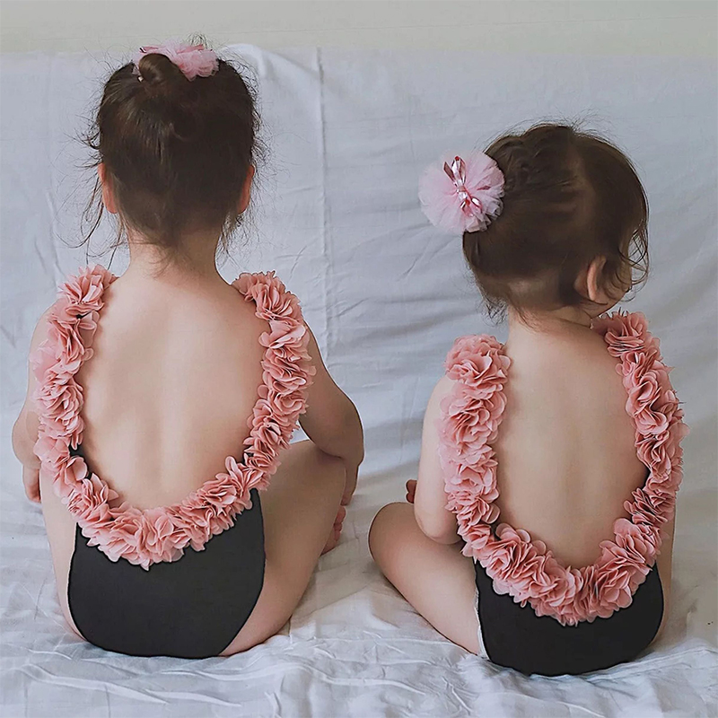 South Korean children's clothing 2022 Girls with solid flowers on the back of a swimsuit and a swimsuit pro-fitting Sanya travel spa