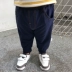 Quần bé nam 1-3 tuổi mùa thu mới màu rắn bé giả quần jeans bé thường quần quần trẻ em thủy triều quần bò bé gái  Quần jean