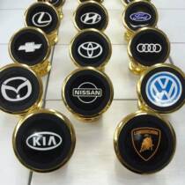 Wholesale magnetic mobile phone holder car logo magnet multifunctional universal navigation instrument panel creative suction disc