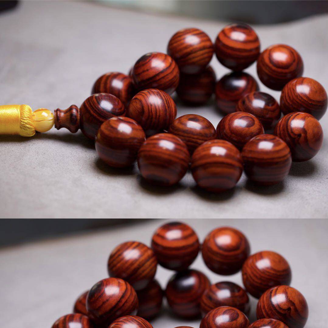 Boutique huanghuali wood big hand-held authentic Hainan old-fashioned grimace tiger skin eye wrinkles text play Buddha beads rosary bracelet