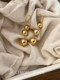 Exquisite and Fashionable! Autumn and Winter Three-Ball Metal Pendant Earrings for Women, Niche High-End Vintage Style, Non-Pierced Ear Clips