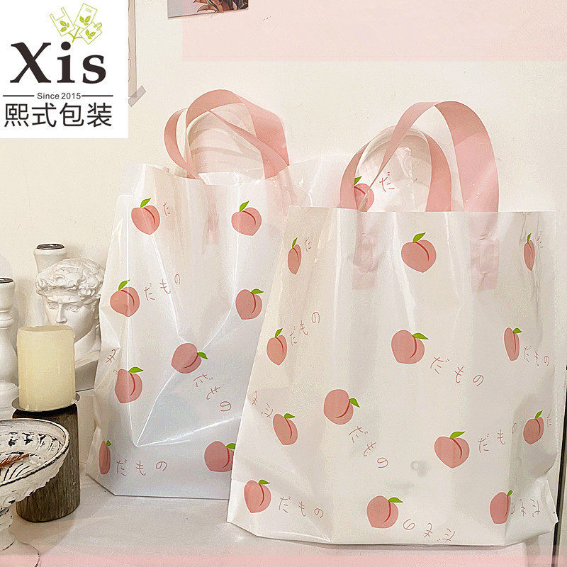 ins net red summer water honey peach pattern plastic hand carry bag Han version clothing store children clothing hand gift wrapping bag