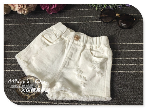 Cô gái đen trắng quần short denim mùa hè bông lỗ trẻ em Hàn Quốc phiên bản của trẻ em lớn phần mỏng quần nóng bên ngoài mặc