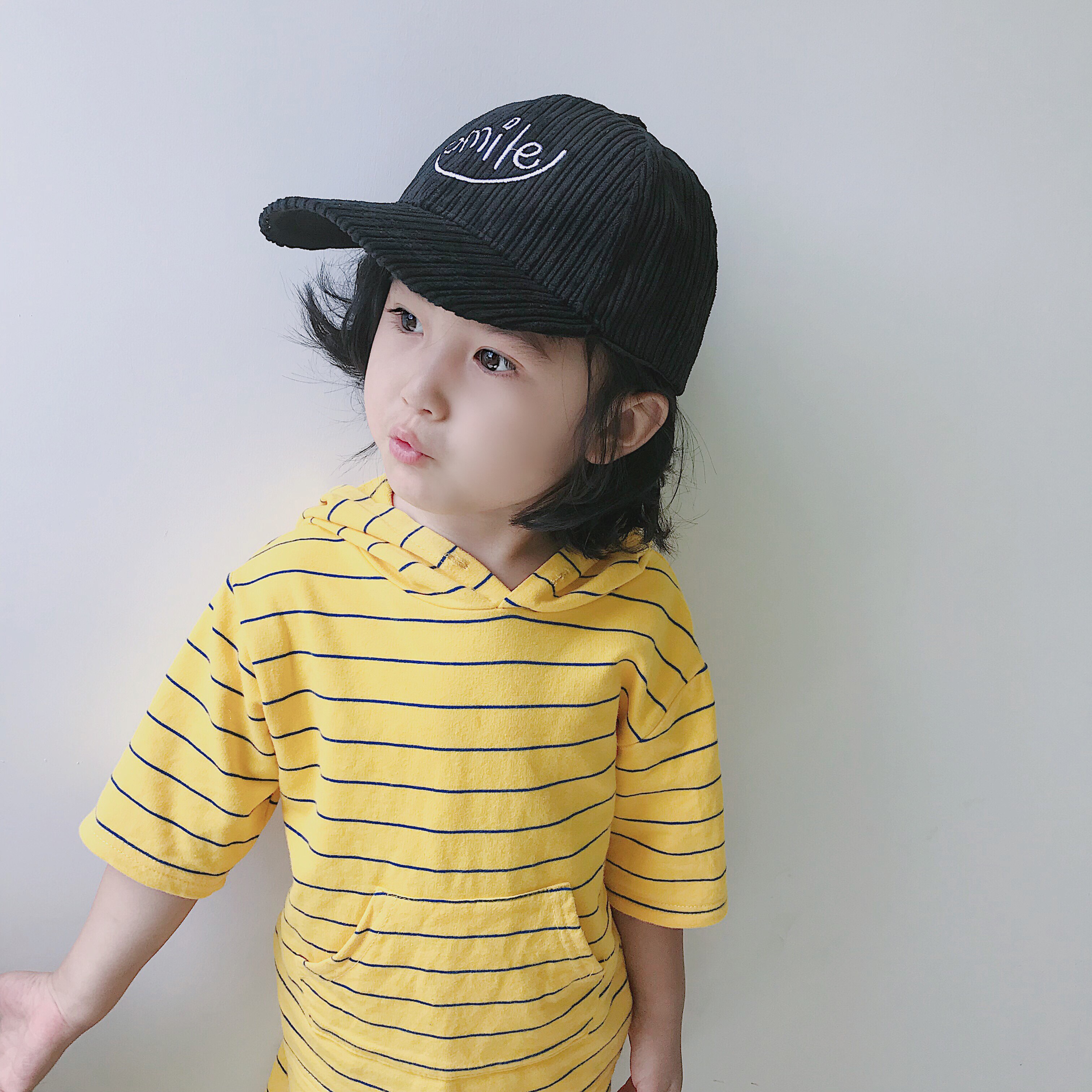 Spring and autumn new children's peaked cap corduroy smiling face baby warm baseball cap thin section children's cap trendy children's hat