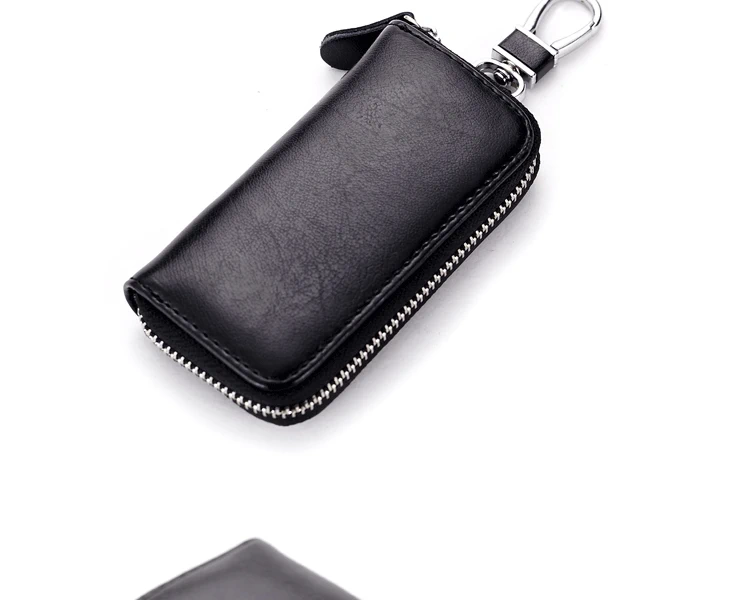 Qiansuo Thời trang túi chìa khóa đơn giản nam và nữ dây kéo da đa chức năng xe chìa khóa túi rắn màu túi khóa - Trường hợp chính