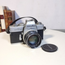 Nostalgic vintage Minolta 135 film SLR mechanical camera old objects display collection ornaments
