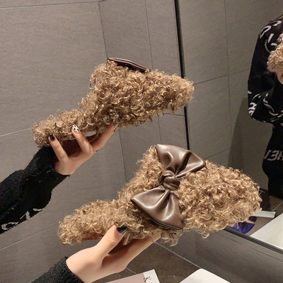 Japanese autumn and winter Baotou slippers female outside wearing wool lamb 100 lap net red plush flat bottom butterfly knot wool cool tug